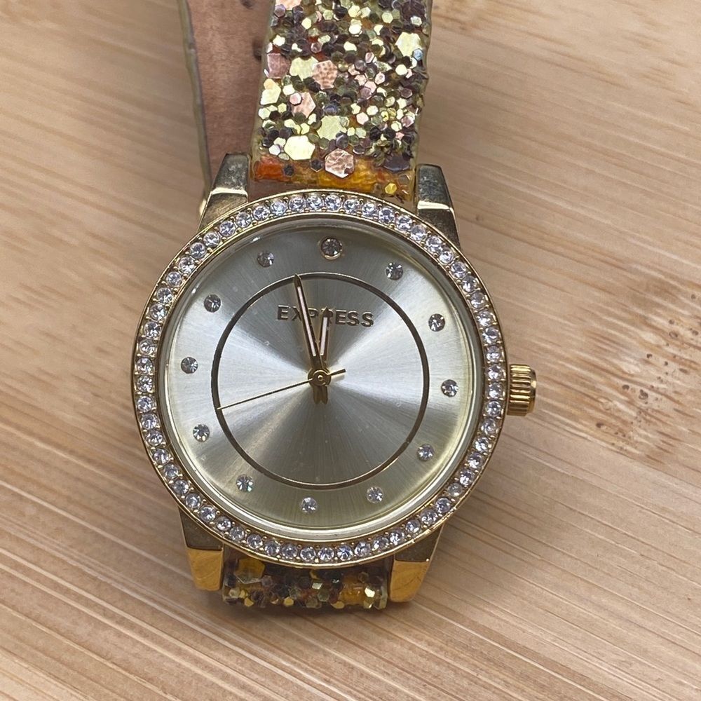Ladies Express 30 meter water resistant watch w/glittered genuine leather band